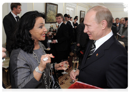 Vladimir Putin and People’s Artist of Russia, Art Director of the Russian Song Company Nadezhda Babkina