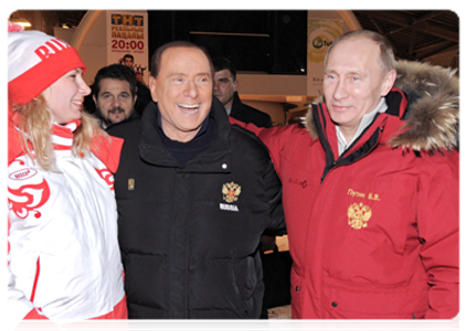 Vladimir Putin and former Italian Prime Minister Silvio Berlusconi at a meeting at the Krasnaya Polyana alpine ski resort