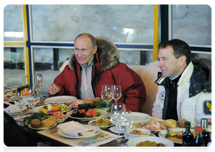Dmitry Medvedev and Vladimir Putin meet with former Italian Prime Minister Silvio Berlusconi at the Krasnaya Polyana alpine ski resort
