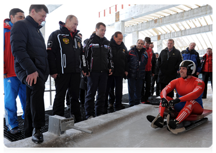 President Dmitry Medvedev, Prime Minister Vladimir Putin and former Italian Prime Minister Silvio Berlusconi visit a bobsleigh and luge track and attend test races in Sochi