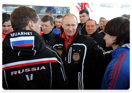 President Dmitry Medvedev, Prime Minister Vladimir Putin and former Italian Prime Minister Silvio Berlusconi visit a bobsleigh and luge track and attend test races in Sochi