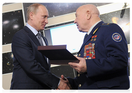 Prime Minister Vladimir Putin and Pilot-Cosmonaut and Two-time Hero of the Soviet Union Alexei Leonov