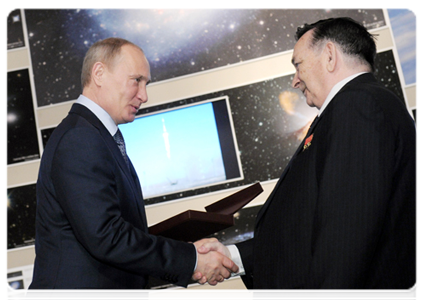 Prime Minister Vladimir Putin and Pilot-Cosmonaut and Two-time Hero of the Soviet Union Valery Bykovsky