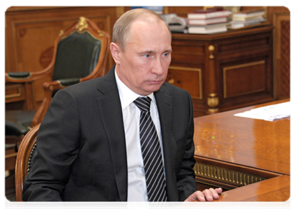 Prime Minister Vladimir Putin meets with Gazprom CEO Alexei Miller