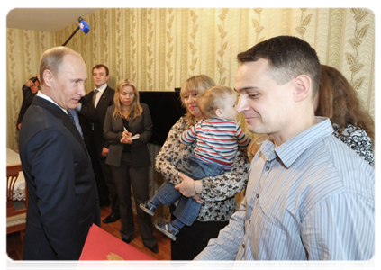 Prime Minister Vladimir Putin inspects new building for servicemen in Engels