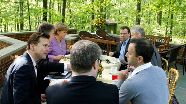 Prime Minister Dmitry Medvedev meets with German Chancellor Angela Merkel at the G8 summit