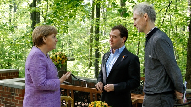 Prime Minister Dmitry Medvedev meets with German Chancellor Angela Merkel at the G8 summit