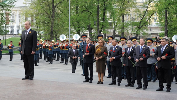 Acting Prime Minister Viktor Zubkov takes part in a wreath-laying ceremony at the Tomb of the Unknown Soldier at the Kremlin Wall in Alexander Garden