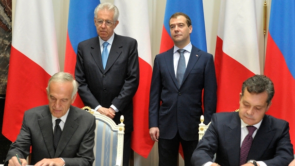 After their meeting, Russian Prime Minister Dmitry Medvedev and Italian Prime Minister Mario Monti attend the signing of a series of documents
