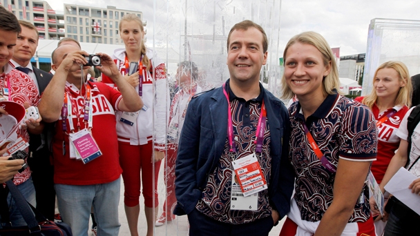 Prime Minister Dmitry Medvedev visits the Olympic Village and speaks with Russian athletes