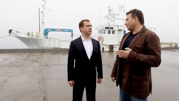 Prime Minister Dmitry Medvedev and Konstantin Korobkov, director of the Yuzhno-Kurilsky Fish Plant