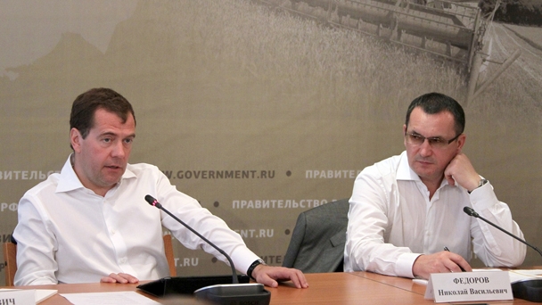 Prime Minister Dmitry Medvedev and Minister of Agriculture Nikolai Fyodorov at the meeting on supporting agricultural producers affected by the abnormal weather