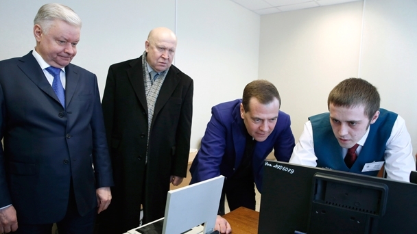 Director of the Federal Migration Service Konstantin Romodanovsky, Nizhny Novgorod Region Governor Valery Shantsev and Prime Minister Dmitry Medvedev
